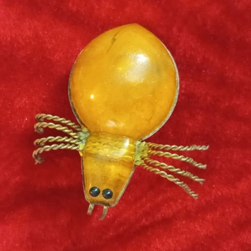 Russian brooch with amber used