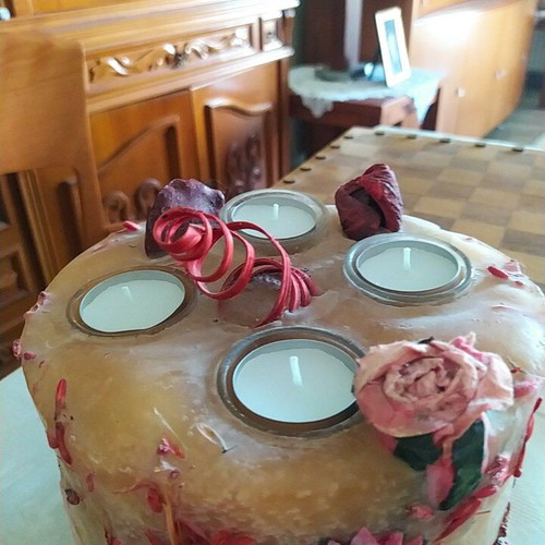 Decorative candle with dried flowers used