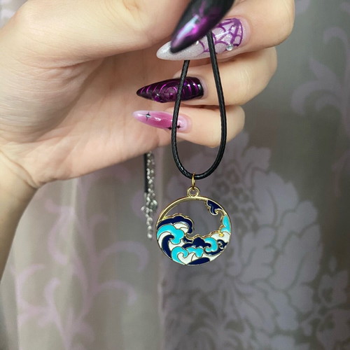 The Wave unisex necklace new with black cord