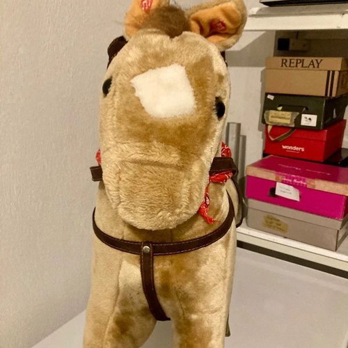 Children's rocking horse used, plush with sound