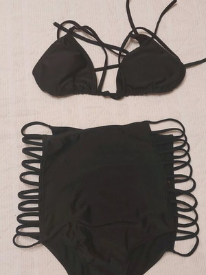 Bikini swimsuit like new, black with unique slip