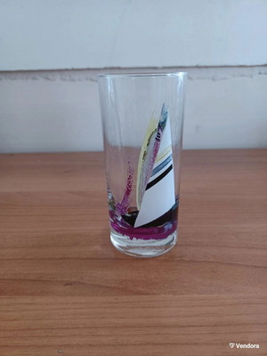 Glass with design in like new condition, height 13 cm