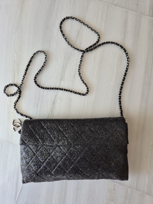 Chanel clutch bag 2014 model like new, leather with matelassé glitter