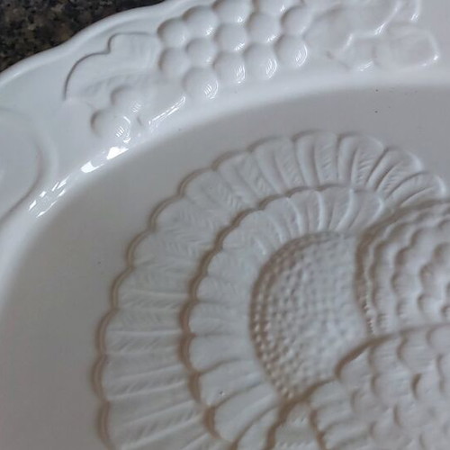 Large ceramic oval platter with embossed design like new