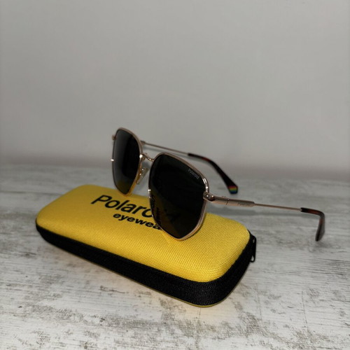 Polaroid sunglasses like new, black metal frame