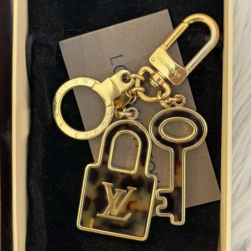 Louis Vuitton bag charm keychain new, gold and brown enamel
