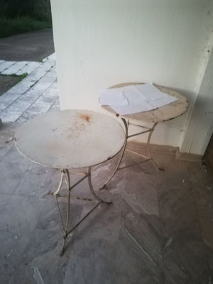 Antique traditional round iron coffee tables from 1950s, used