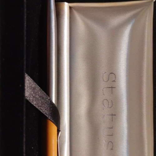 Vintage Status pen case with silver and tan metal pen like new