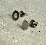 Silver asymmetric 925 studs with geometric circles, like new