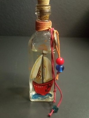 Handmade glass decorative bottle used