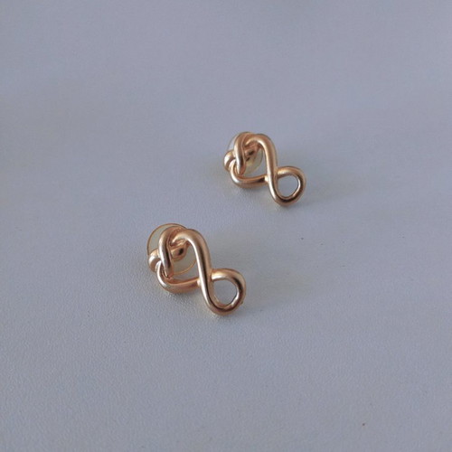 Gold infinity-shaped earrings like new