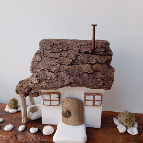 Handmade sea-themed driftwood diorama with Greek island house