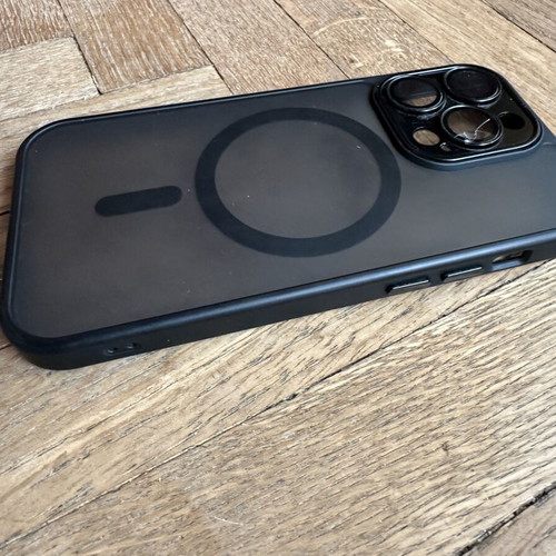 iPhone 14 Pro case with broken right lens protector