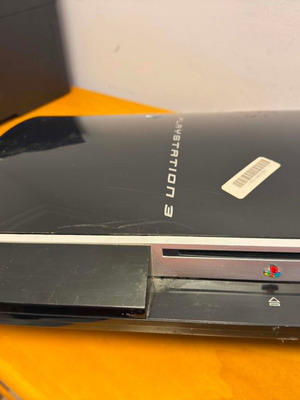 PlayStation 3 (PS3) used console with broken plastic and non-working CPU