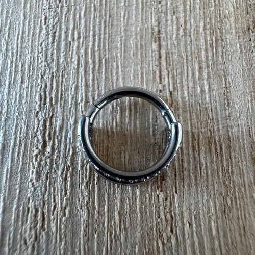 Piercing septum earring with sparkling stones, silver tone