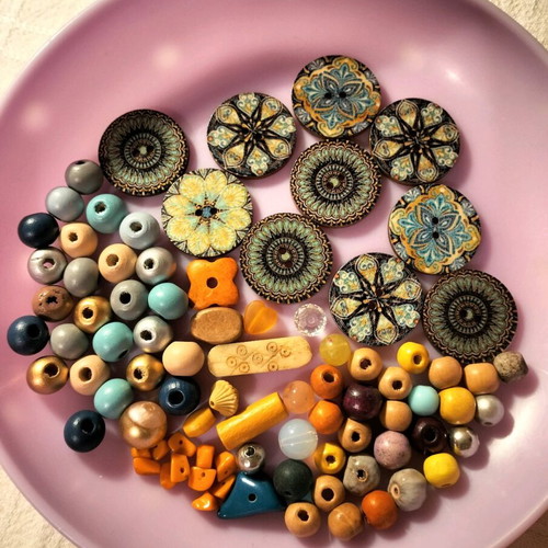 Decorative beads and buttons used, wooden