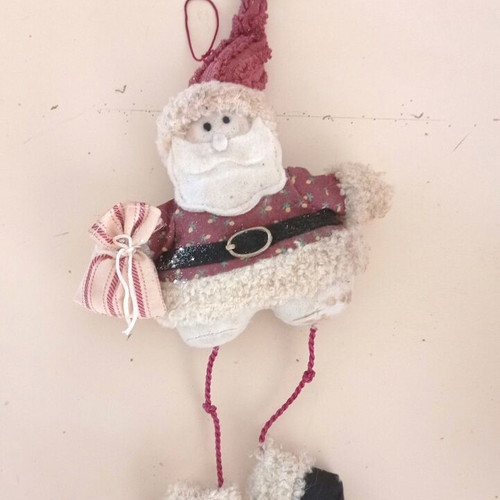 Handmade knitted Christmas ornaments used, Santa and reindeer