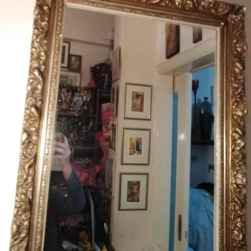 Antique mirror used with carved frame in gold crackle finish