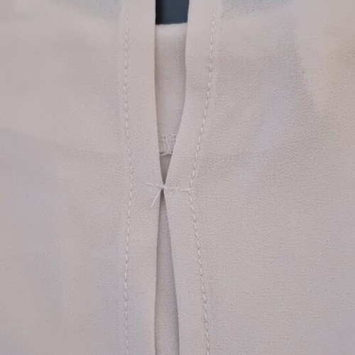 Blouse beige, like new, semi-transparent with open back