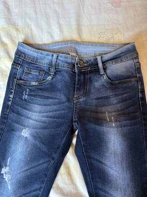 Dark blue skinny jeans with black lace and distressed details, size S, like new