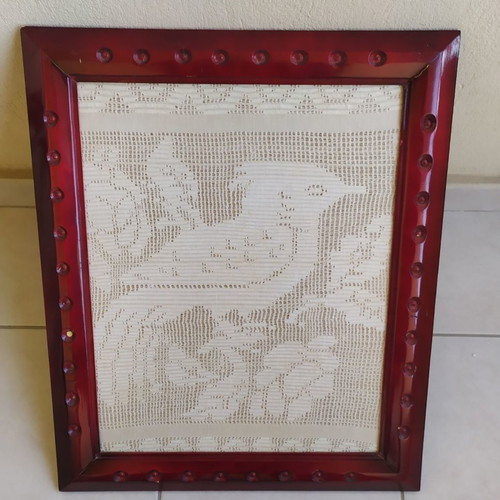 FRAME. THE BIRD IS WOVEN ON THE LOOM IN THE YEAR 1950