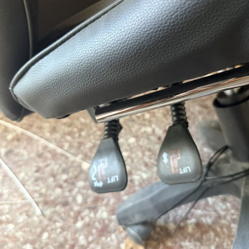 Office chair in black PU leather with footrest