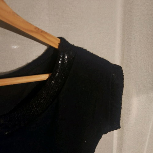 Dress with short sleeves used, black with subtle sequins