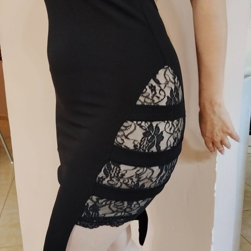 Black mini dress like new with open back and lace slit