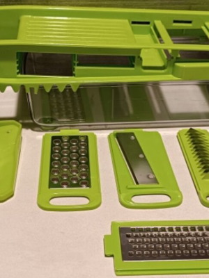 Plastic vegetable slicer like new, used few times