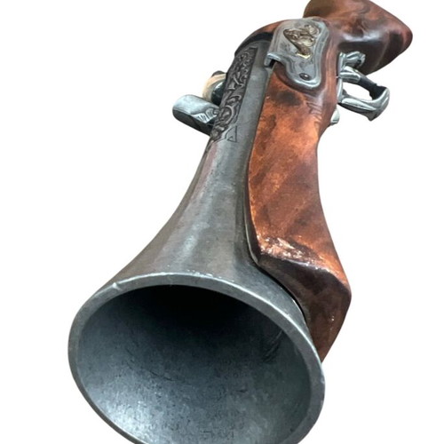 Decorative blunderbuss flintlock pistol used with wooden stock