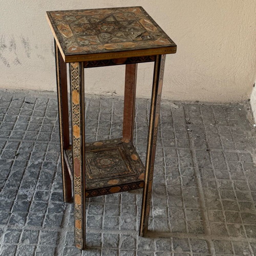Wooden decorative table with carvings used, vintage style