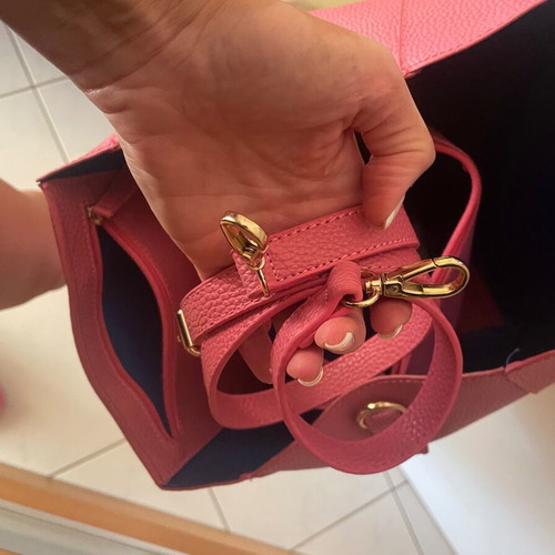 Pink handbag like new with strap and inner pocket