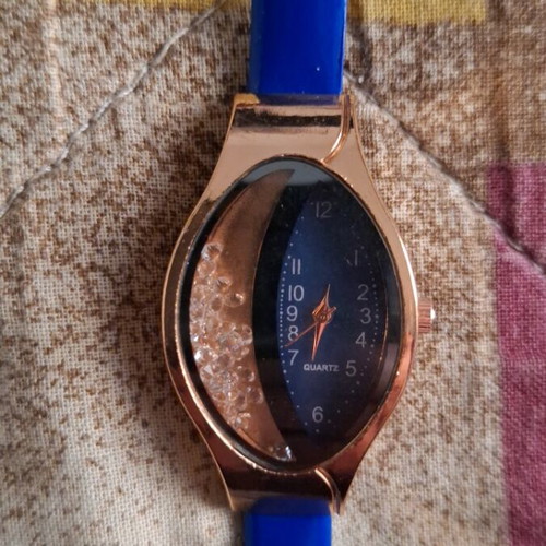 Wristwatch new with modern design in blue color