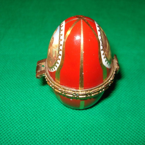 Porcelain decorative egg like new