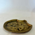 Vintage brass ashtray with embossed World War I scene used