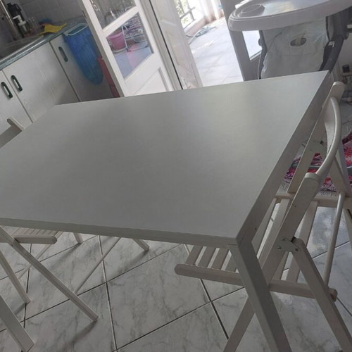 IKEA white dining set with 4 folding chairs