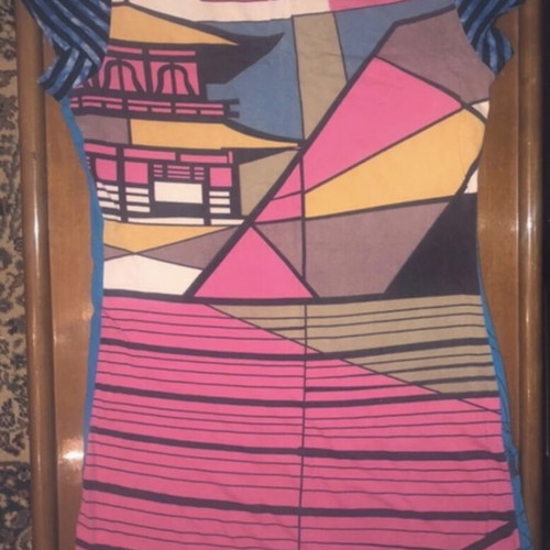 Yes Miss multicolor blouse dress used, different colors front and back