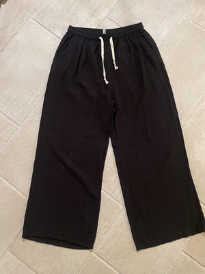 Black wide-leg pants with elastic waist and drawstring, size L-XL