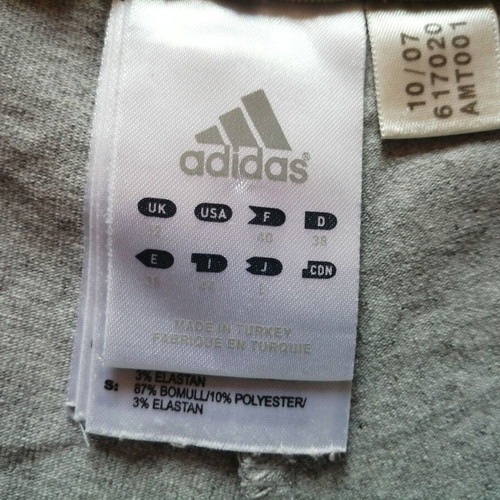 Adidas women's grey sports shorts, size S-M