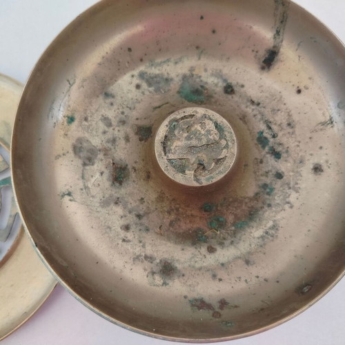Metal incense burner used with decorative elements from the Chinese zodiac