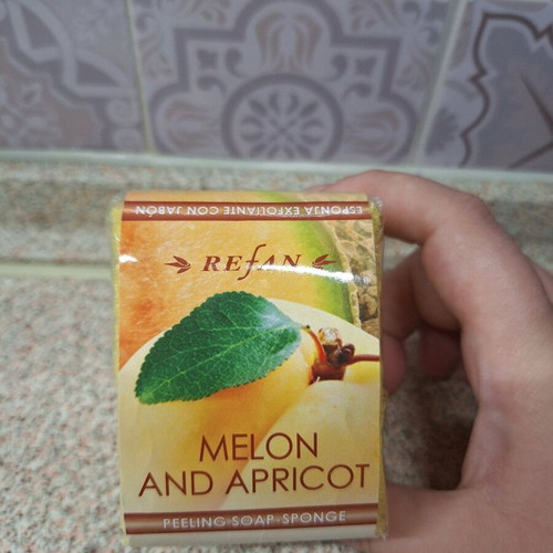 Body peeling soap and sponge new with melon and apricot extract