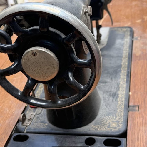 Singer sewing machine used with cabinet