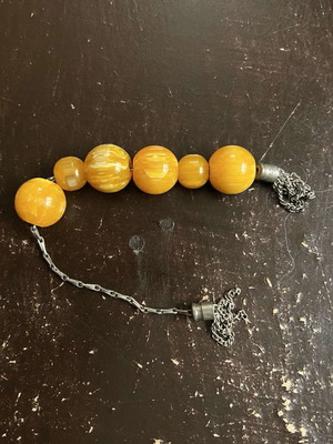 Orange worry beads used