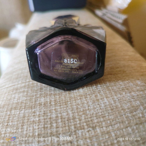 Elizabeth Taylor Passion perfume bottle used, without fragrance