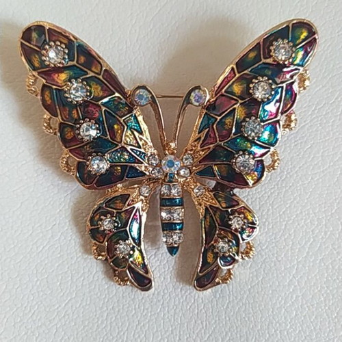Butterfly brooch with rhinestones new, multicolor and gold