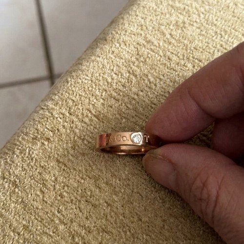 Ring in rose gold color with 3 zirconia, like new