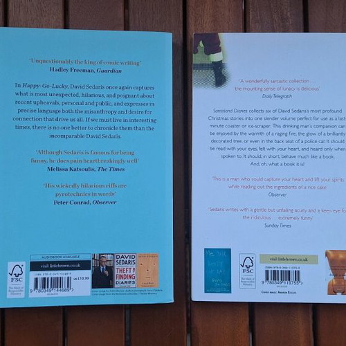 David Sedaris books like new, Happy-Go-Lucky and Santaland Diaries, 2 pcs