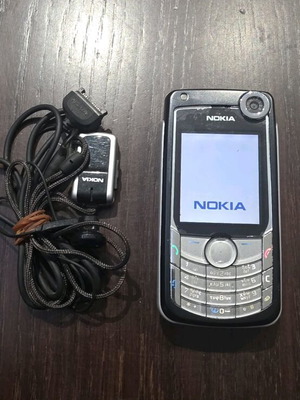 Nokia 6680 like new with original headphones without battery