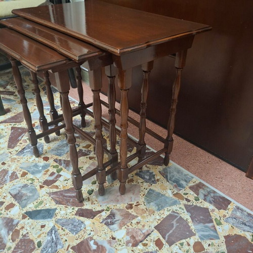 Set of three vintage wooden nesting tables, dark honey color