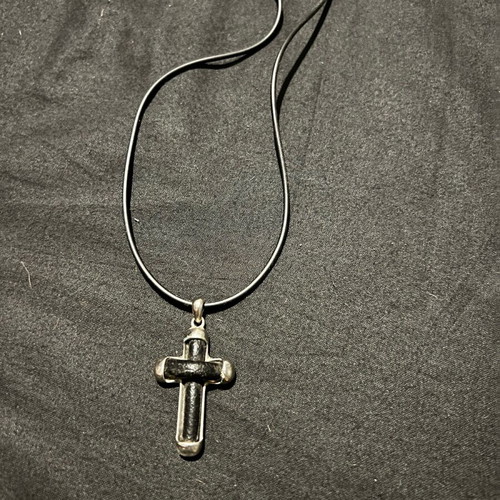 Silver cross with leather like new